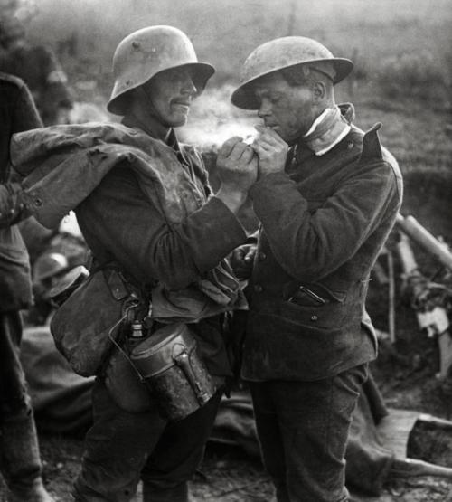 British and German soldiers exchanging cigarettes and other gifts during the Christmas Truce of 1914